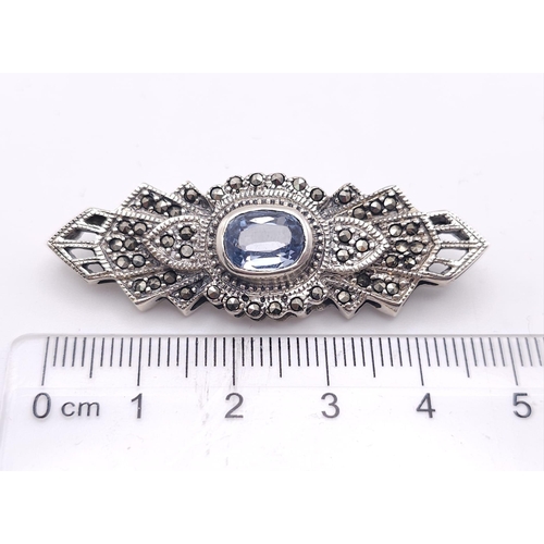 691 - An Exquisite Design Sterling Silver and Topaz Art Deco style Brooch. 5cm Wide. Gross Weight 8.88 Gra... 