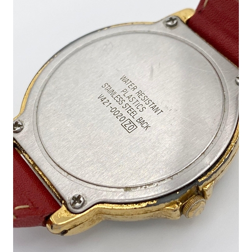 864 - A Lorus Quartz Mickey Mouse Watch. Red leather strap. Gilded case - 34mm. Mickey dial. In working or... 