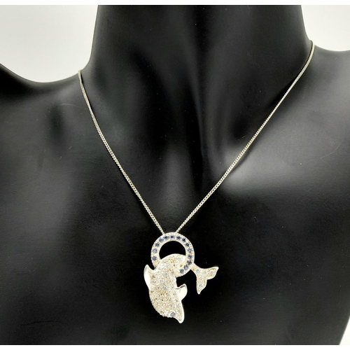 872 - An Unworn Sterling Silver Stone Set Dolphin Pendant Necklace in Presentation Box. 46cm Length. Penda... 