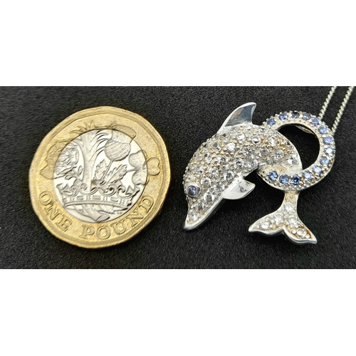 872 - An Unworn Sterling Silver Stone Set Dolphin Pendant Necklace in Presentation Box. 46cm Length. Penda... 