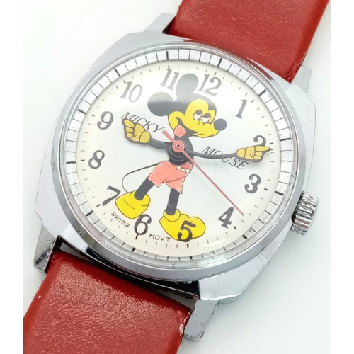 900 - A Vintage Mickey Mouse Mechanical Watch. Red leather strap. Stainless steel case - 32mm. Mickey dial... 