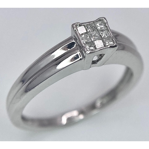 629 - 9K WHITE GOLD DIAMOND RING, APPROX 0.18CT DIAMONDS, WEIGHT 1.9G SIZE K