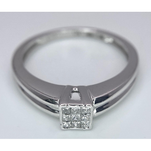 629 - 9K WHITE GOLD DIAMOND RING, APPROX 0.18CT DIAMONDS, WEIGHT 1.9G SIZE K