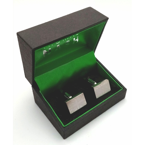 632 - A pair of THOMAS NASH Union Jack cufflinks in original presentation box.