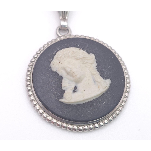 785 - A sterling silver Cameo pendant on silver belcher chain. Total weight 5.3G. Total length 43cm.