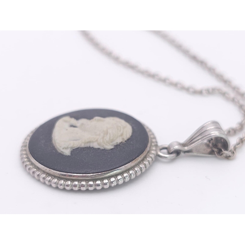 785 - A sterling silver Cameo pendant on silver belcher chain. Total weight 5.3G. Total length 43cm.