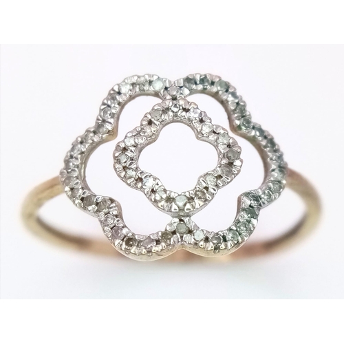 811 - 9K YELLOW GOLD DIAMOND SET OPEN FLOWER DESIGN RING, WEIGHT 1.1G SIZE O