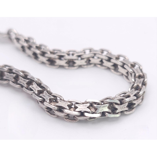 906 - A vintage 925 silver interlock link bracelet. Total weight 7.85G. Total length 17.5cm.