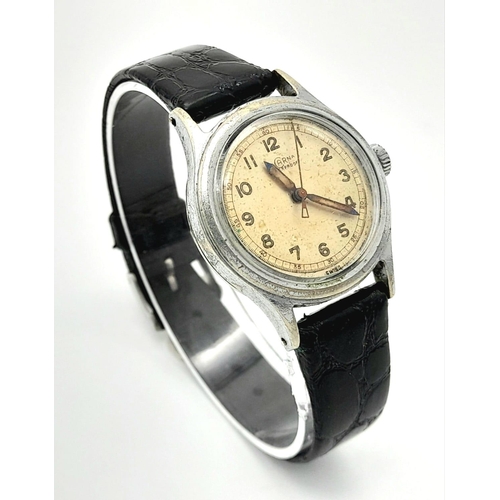 928 - A Vintage Incarna Mechanical Gents Watch. Black leather strap. Stainless steel case - 30mm. Aged dia... 