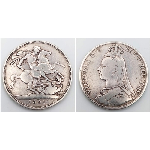 1031 - An 1891 Queen Victoria Silver Crown. VF grade but please see photos.