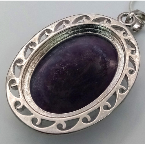 1078 - An Amethyst Oval Pendant on a 925 Silver Necklace. 5cm and 42cm.