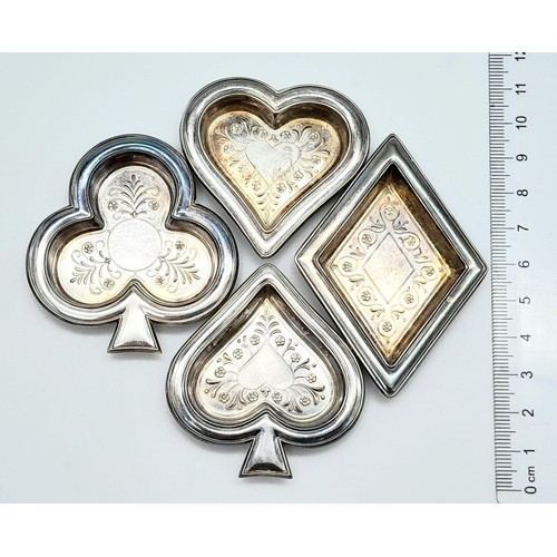 562 - A collection of four sterling silver Gambling Ashtrays in original box. Tweight: 49 g.