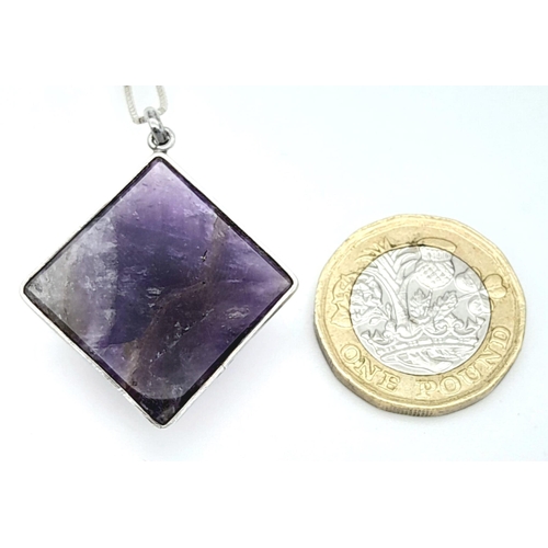 976 - A Sterling Silver Pyramid Cut Amethyst Pendant Necklace. 37cm Length. Amethyst Measures 2cm Width. G... 