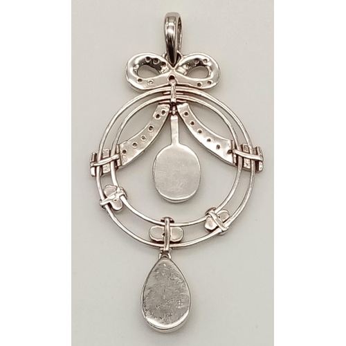 1001 - A VERY ATTRACTIVE STERLING SILVER STONE SET FANCY DROP PENDANT, BOW TIE DESIGNED WITH 2 LARGE MOONST... 