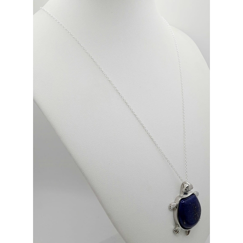 1064 - A Lapis Lazuli Turtle Pendant on a Disappearing 925 Silver Necklace. 4.5cm and 42cm.