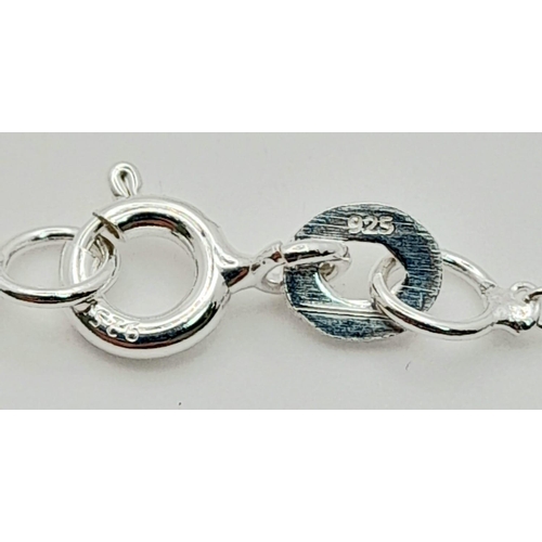 1064 - A Lapis Lazuli Turtle Pendant on a Disappearing 925 Silver Necklace. 4.5cm and 42cm.