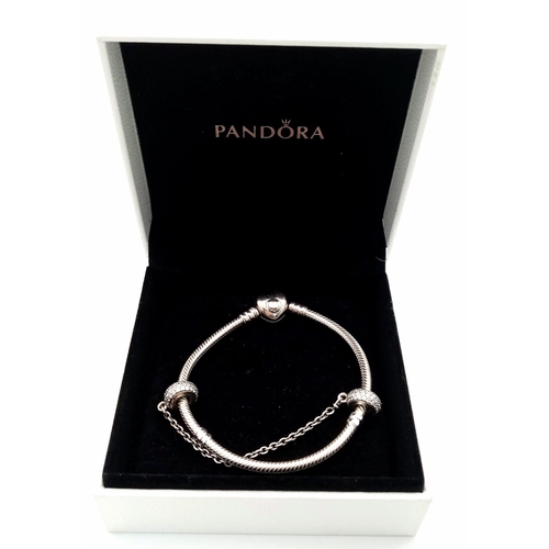 618 - A PANDORA - Moments sterling silver bangle with original box. Weight: 19 g.