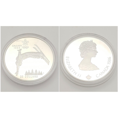 639 - Two Commemorative 1988 Calgary Winter Olympic Games Silver Coins. Both weigh a troy ounce and are pr... 