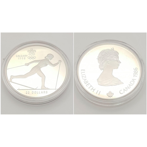 639 - Two Commemorative 1988 Calgary Winter Olympic Games Silver Coins. Both weigh a troy ounce and are pr... 