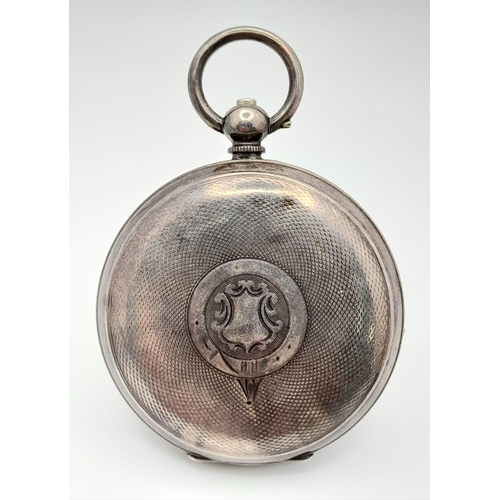 653 - A Sterling Silver Cased Antique Fattorini and Sons - The Accurate Pocket Watch. 54mm case diameter. ... 