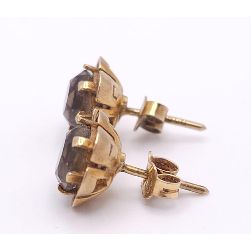 661 - A Pair of Vintage 9K Yellow Gold Smoky Quartz Stud Earrings. 2.65g weight.