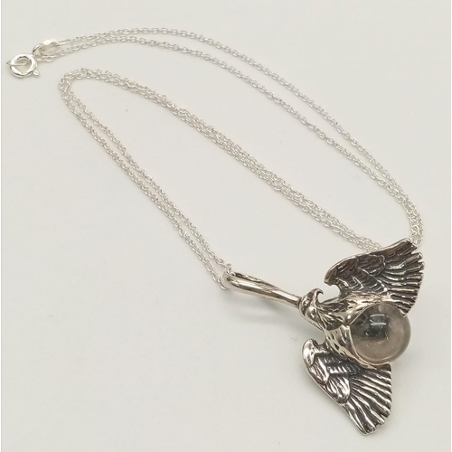 662 - A Unique Sterling Silver Eagle and Crystal Ball Pendant Necklace. Sterling Silver Pendant Measures 3... 