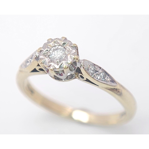 699 - 9K YELLOW GOLD SOLITAIRE DIAMOND RING, WITH FURTHER DECORATING DIAMONDS ON SHOULDERS, WEIGHT 2.2G SI... 