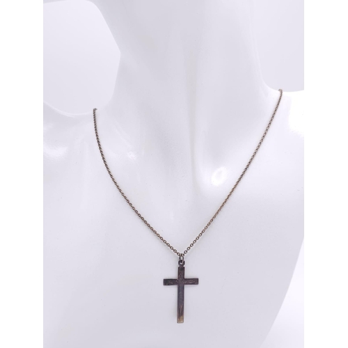 849 - A vintage sterling silver cross pendant on silver belcher chain. Total weight 3.7G. Total length 42c... 