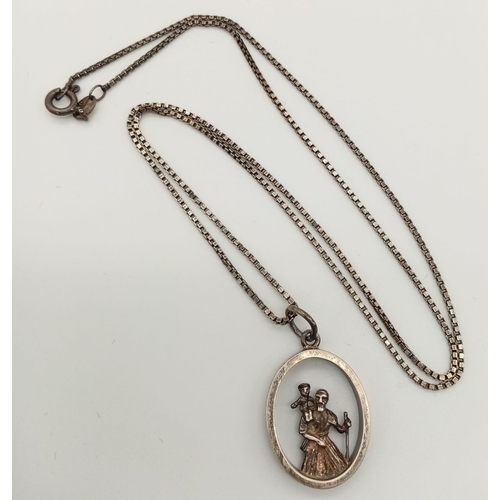 892 - A vintage sterling silver St Christopher pendant on silver box chain. Total weight 7.1G. Total lengt... 