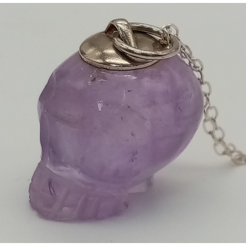 948 - A Sterling Silver Carved Amethyst Skull Pendant Necklace. 42cm Length. Pendant Measures 2cm Length. ... 