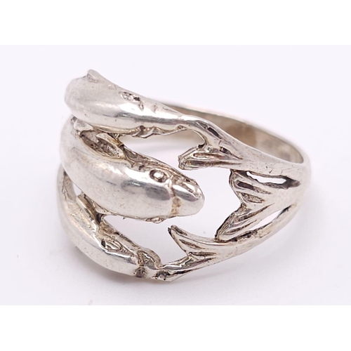 998 - A Unique Sterling Silver Leaping Dolphins Ring Size N. The Crown Measures 1.4cm Wide. The Ring Weigh... 