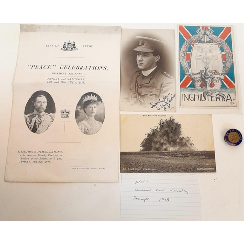 1049 - A WW1 Small Collection of Items: Peace celebrations booklet, 1914 lapel badge and 3 postcards.