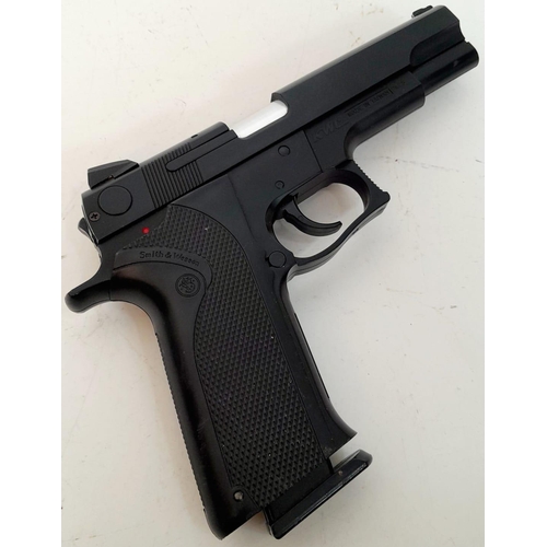 543 - A Smith and Wesson Soft Air 6mm BB Air Pistol. Full Working Order. Comes with Anglo Arms Holster. UK... 