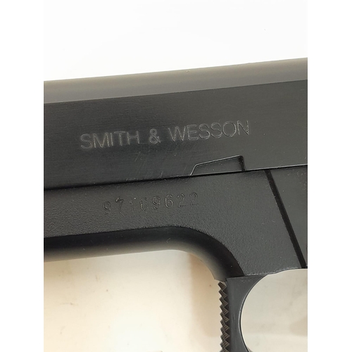 543 - A Smith and Wesson Soft Air 6mm BB Air Pistol. Full Working Order. Comes with Anglo Arms Holster. UK... 