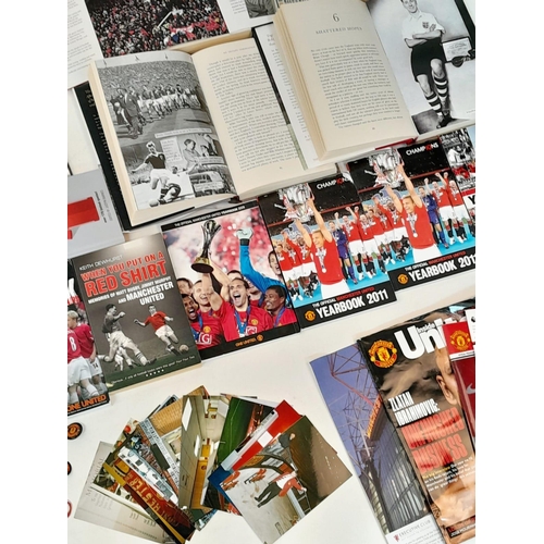 620 - A Potpourri of Manchester United Collectibles: Books, Pictures and Programmes. Over thirty items. Pl... 