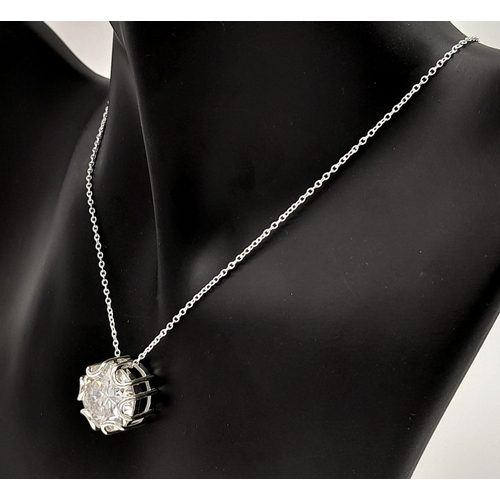 664 - A 10.4ct White Moissanite Pendant on a 925 Silver Necklace. 
16mm and 42cm. Ref: CD1245