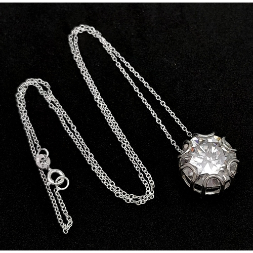 664 - A 10.4ct White Moissanite Pendant on a 925 Silver Necklace. 
16mm and 42cm. Ref: CD1245