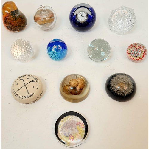 946 - An Eclectic Mix of 12 Glass Paperweights.