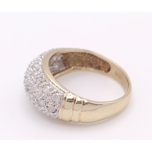 776 - A 9K YELLOW GOLD DIAMOND BAND RING, APPROX 0.25CT, WEIGHT 3.8G SIZE L