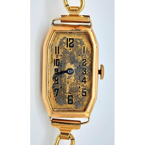 919 - A 9K Gold Cased Vintage Watch. In need of repair so a/f. Bracelet is rolled gold.