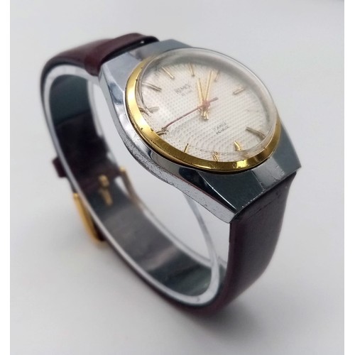 638 - A Vintage Remex De Luxe Automatic Gents Watch. Burgundy leather strap. Stainless steel case - 33mm. ... 