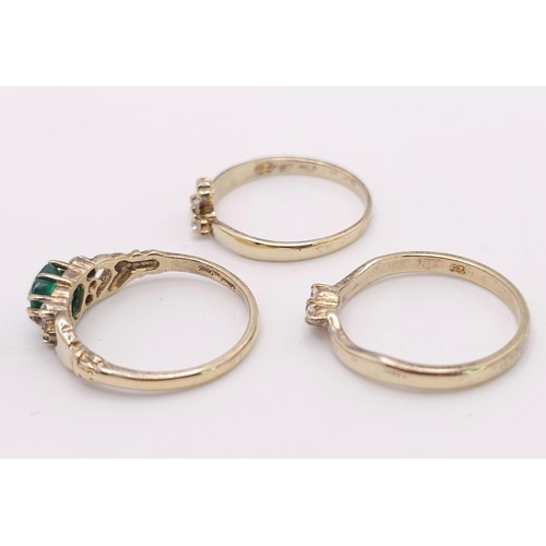 1023 - Three sterling silver and gold plated rings, size O, total weight: 5.4 g.