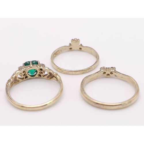 1023 - Three sterling silver and gold plated rings, size O, total weight: 5.4 g.