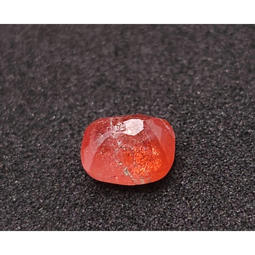 860 - A 1.32ct Madagascar AIG Certified Orange Sapphire Gemstone.