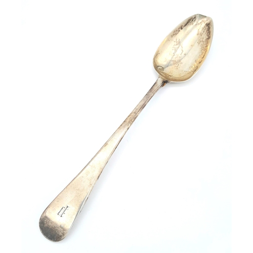 1141 - An antique Georgian sterling silver spoon with full London hallmarks, 1799. Total weight 63.1G. Tota... 