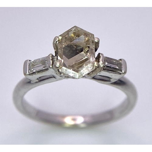 1251 - A LARGE 1ct TRAPEZE CUT CHAMPAGNE DIAMOND FLANKED BY BAGUETTE DIAMOND SHOULDERS SET IN 18K GOLD .2.6... 