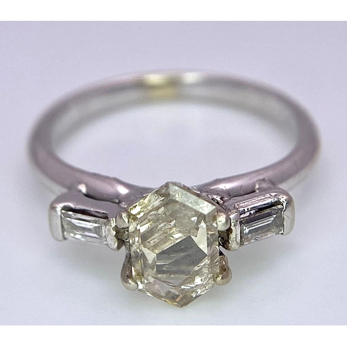 1251 - A LARGE 1ct TRAPEZE CUT CHAMPAGNE DIAMOND FLANKED BY BAGUETTE DIAMOND SHOULDERS SET IN 18K GOLD .2.6... 