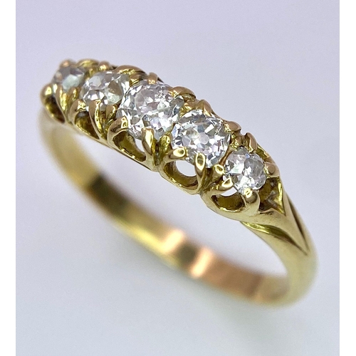 1258 - AN ANTIQUE 5 STONE OLD CUT DIAMOND RING SET IN 18K GOLD .3.0gms   size N