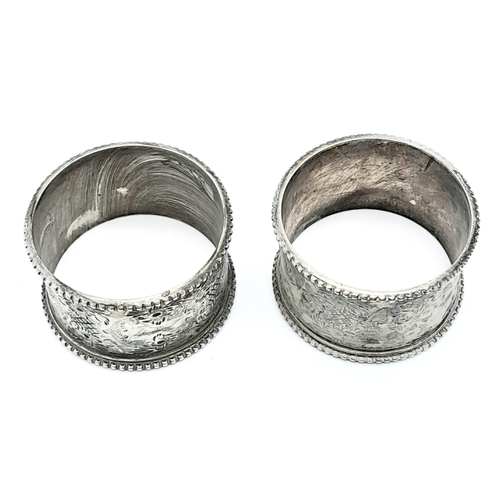 1268 - A pair of antique sterling silver napkin holders with fabulous engravings. Full hallmarks Sheffield,... 