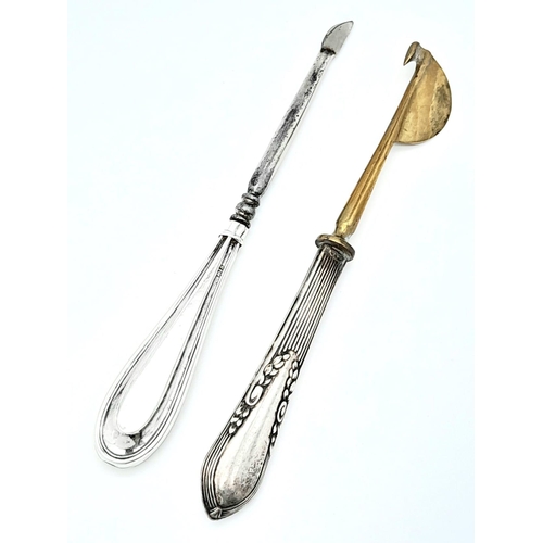 1292 - An antique sterling silver handled manicure set, one with full Birmingham hallmarks, 1917. The other... 